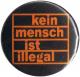 25mm Button: Kein Mensch ist illegal (orange/schwarz)