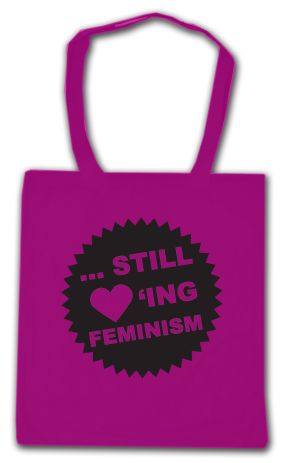 Baumwoll-Tragetasche: ... still loving feminism (schwarz/pink)