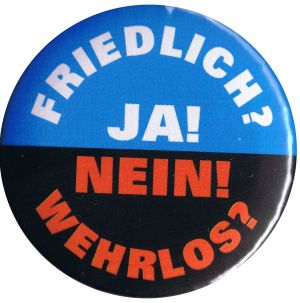 50mm Button: Friedlich? Ja! Wehrlos? Nein!