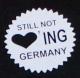 Zum Polo-Shirt "Still not loving Germany" für 16,10 € gehen.