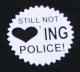 Zum Polo-Shirt "Still not loving police! (weiß)" für 16,10 € gehen.
