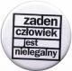 Zur Artikelseite von "Zaden Czlowiek jest nielegalny", 25mm Button für 0,90 €