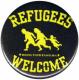 Zur Artikelseite von "Refugees welcome (gelb/schwarz)", 37mm Button für 1,10 €