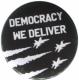 Zum 37mm Magnet-Button "Democracy we deliver" für 2,50 € gehen.