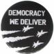 Zum 25mm Magnet-Button "Democracy we deliver" für 2,00 € gehen.