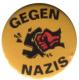 Zum 37mm Magnet-Button "Gegen Nazis - gelb" für 2,50 € gehen.