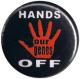 Zum 37mm Magnet-Button "Hands off our genes" für 2,50 € gehen.