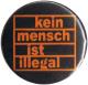 Zum 37mm Magnet-Button "kein mensch ist illegal (orange/schwarz)" für 2,50 € gehen.