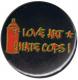 Zum 37mm Magnet-Button "Love Art hate Cops (schwarz)" für 2,50 € gehen.
