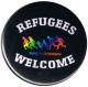 Zum 50mm Magnet-Button "Refugees welcome (bunte Familie)" für 3,00 € gehen.