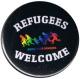 Zum 25mm Button "Refugees welcome (bunte Familie)" für 0,80 € gehen.