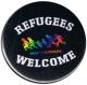 Zum 37mm Button "Refugees welcome (bunte Familie)" für 1,10 € gehen.