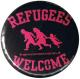 Zum 37mm Magnet-Button "Refugees welcome (pink)" für 2,50 € gehen.