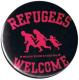 Zum 50mm Magnet-Button "Refugees welcome (pink)" für 3,00 € gehen.