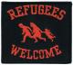 Zum Aufnäher "Refugees welcome (rot)" für 3,00 € gehen.