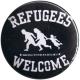 Zum 50mm Magnet-Button "refugees welcome (weiß)" für 3,00 € gehen.