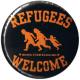Zum 37mm Button "Refugees welcome" für 1,10 € gehen.