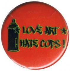 Zum 37mm Magnet-Button "Love Art hate Cops (rot)" für 2,50 € gehen.