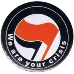 Zum 50mm Magnet-Button "We are your crisis" für 3,00 € gehen.
