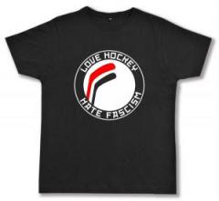 Zum Fairtrade T-Shirt "Love Hockey Hate Fascism" für 19,45 € gehen.