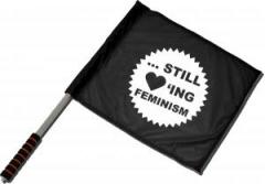 Zum/zur  Fahne / Flagge (ca. 40x35cm) "... still loving feminism" für 15,00 € gehen.