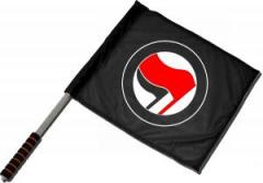 Zum/zur  Fahne / Flagge (ca. 40x35cm) "Antifaschistische Aktion (rot/schwarz, ohne Schrift)" für 15,00 € gehen.