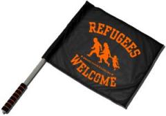 Zum/zur  Fahne / Flagge (ca. 40x35cm) "Refugees welcome (bring your families)" für 11,00 € gehen.