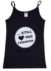 Zum Trägershirt "... still loving feminism" für 15,00 € gehen.